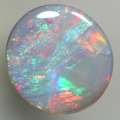 SOLID SEMI BLACK OPAL Pretty opal, reds to purple to green to red